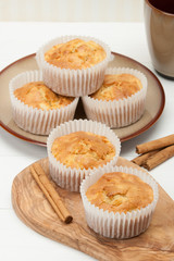 Homemade Apple Cinnamon Muffins On Olive Board.