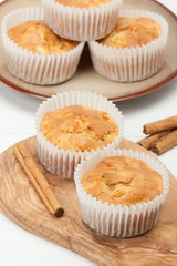 Homemade Apple Cinnamon Muffins On Olive Board.