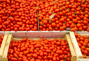 Pile of ripe tomatoes for sale at a market