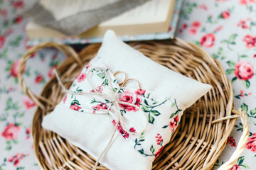 Wedding rings on a cushion handmade.