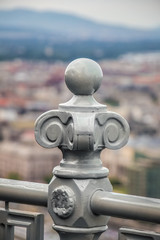 Old vintage ironworks on a balustrade fence in a historic city