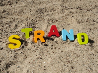 Obraz premium Strand Buchstaben