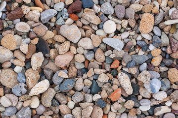 background made of a closeup of a pile of pebbles