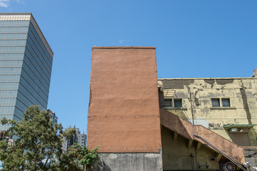 Large blank billboard on a street wall, banners with room to add your own text

