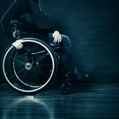 Woman invalid girl sitting on wheelchair