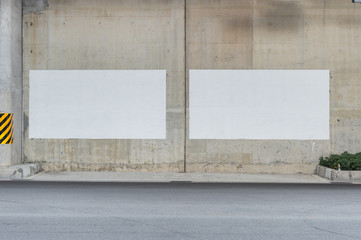 Large blank billboard on a street wall, banners with room to add your own text