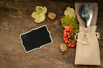 Thanksgiving autumn place setting with cutlery