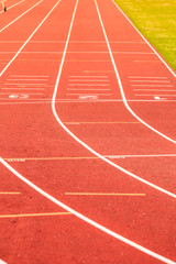 Fototapeta premium Red running track in stadium.