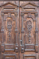 Ancient old entrance door looking like shabby chic texture