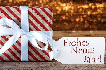 Fototapeta na wymiar Atmospheric Christmas Gift With Label, Neues Jahr Means New Year