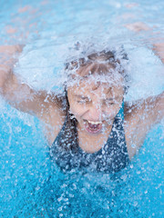 Happy girl in pool
