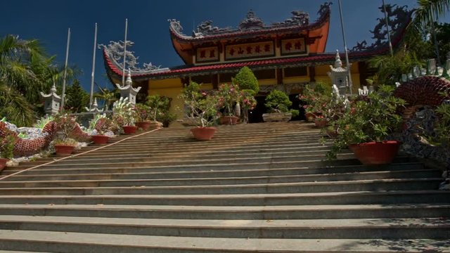 Motion up Steps to Buddha Pagoda Flowers Long Dragon