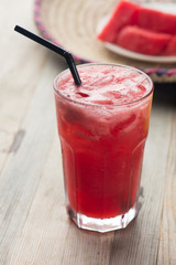 Watermelon drink in glasses with slices of watermelon