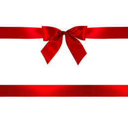 Red gift bow and ribbon on white background with clipping path.