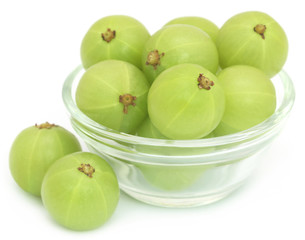 Amla fruits in a glass bowl