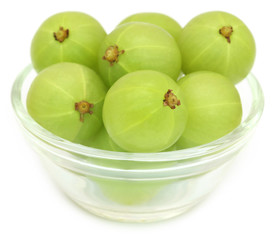 Amla fruits in a glass bowl