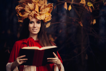 Woman With Autumn Leaves Crown Reading a Book