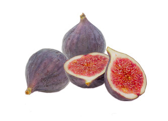 Several fresh fig fruit on a light background