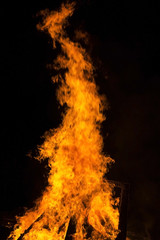 Fototapeta na wymiar Fire flames on a black background. Blaze fire flame texture back