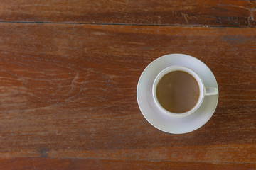 Retro style or Vintage Style,  Coffee cup Put on a stump or wood table in the garden sunny morning.