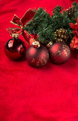 Shiny christmas balls on red background