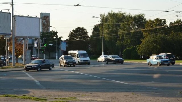 Many cars on busy street of city. Time lapse