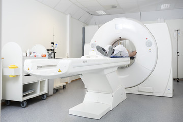 Patient Undergoing CT Scan In Hospital