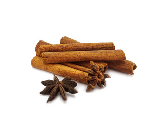 Star anice and cinnamon stick on white background