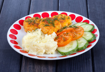 vegetarian food. carrot cutlets with mashed potatoes and vegetables close up