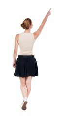 back view of walking  woman in dress. beautiful blonde girl in motion.  backside view of person.  Rear view people collection. Isolated over white background.