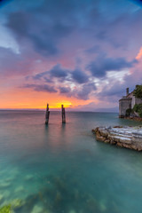 Fototapeta na wymiar Beautiful sunset in villa Lake Garda