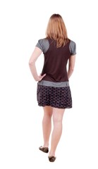 back view of going blonde woman  in  dress. beautiful girl in motion.  backside view of person. Isolated over white background. Rear view people collection. 