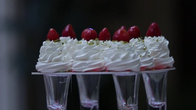 delicious decorated candy bar, sweets on tables for wedding reception
