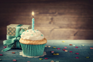 Cupcake with birthday candle - 120156191