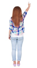 Back view of  pointing woman. beautiful redhead girl in jeans. Rear view people collection.  backside view of person.  Isolated over white background.