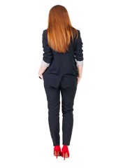 back view of redhead business woman contemplating. Young girl in suit.  Rear view people collection.  backside view of person.  Isolated over white background.