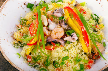 Couscous with vegetables and seafood