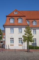 Fototapeta na wymiar Old building on the central square of Quakenbruck