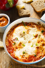 Omelette with cheese, bell pepper and tomatoes