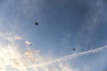 Three drones in the sky