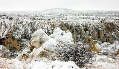 The amazing landscape of valley covered with snow, Cappadocia, Turkey