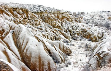 The amazing landscape of valley covered with snow, Cappadocia, Turkey