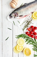 Raw trout, rosemary, tomatoes, lemon, thyme