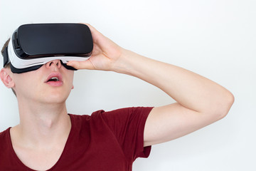 surprised man using virtual reality glasses