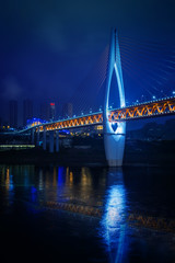 China cityscape at the Jialing River and Qianximen Bridge.