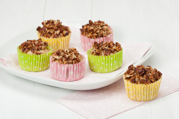 Colorful Homemade Cupcakes With Pecan And Maple Syrup.