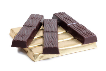 Coffee beans and chocolate on a white background