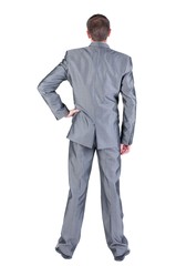 Businessman  looks ahead. rear view. Isolated over white  