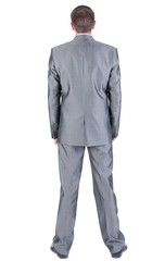 Businessman  looks ahead. rear view. Isolated over white  