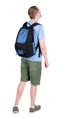 Back view of man with   backpack looking up. Rear view people collection.  backside view of person.  Isolated over white background. guy in the green t-shirt stands with a suitcase on wheels